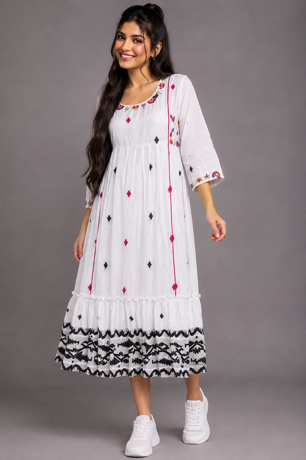 Woman wearing Kahaani white Jamdani cotton dress with woven florals and colourful embroidery by Nayab Pitara